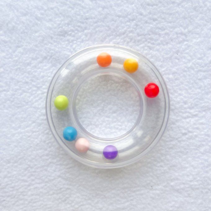 Bruitage anneau bébé billes transparent - 63 mm